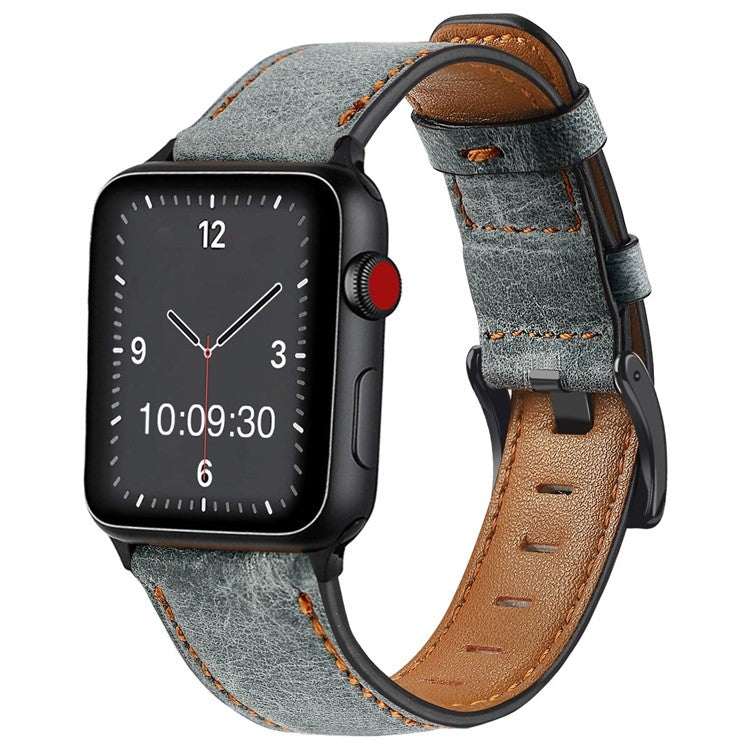 Retro leather Apple Watch strap with colorful contrasting stitching on display