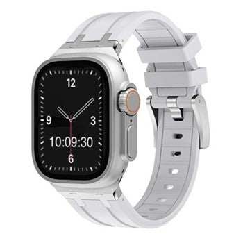 Silicone sport Apple Watch strap in white with silver buckle, compatible with 38-40mm sizes.